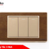 Công tắc 3 nút vân gỗ viền vàng
